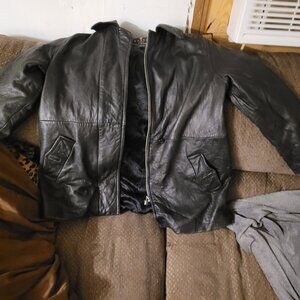 a black leather and suede Garantie De Qualite "Express" coat size M